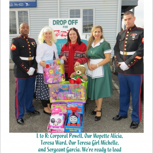 Teresa's Family Cleaning team at community Toys for Tots event